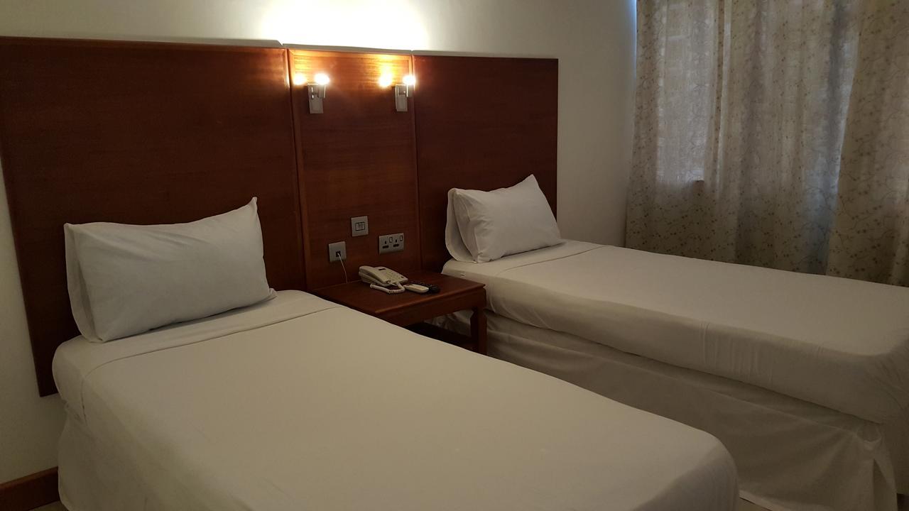 Golden Gate Hotel Кумаси Екстериор снимка